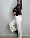 Top con fiocchetti in pizzo