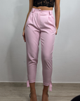 Pantaloni con fibbia